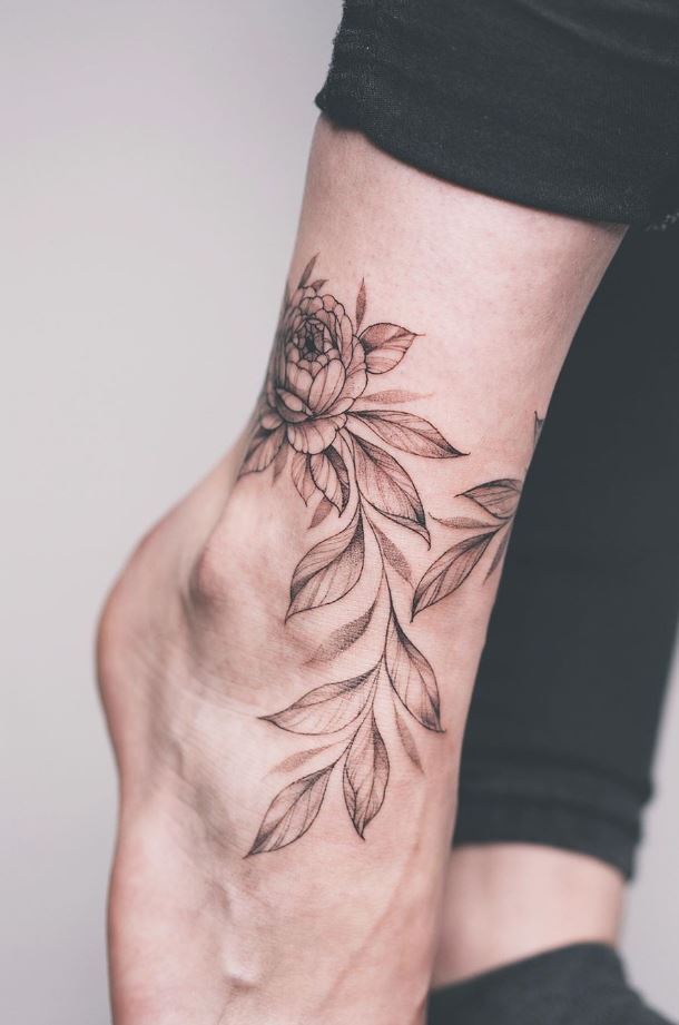Marvelous Black And Gray Flower Tattoo