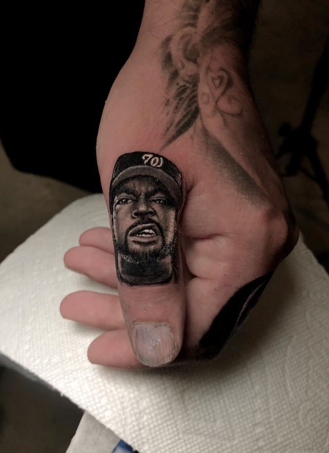 Ice Cube Knuckle Tattoo