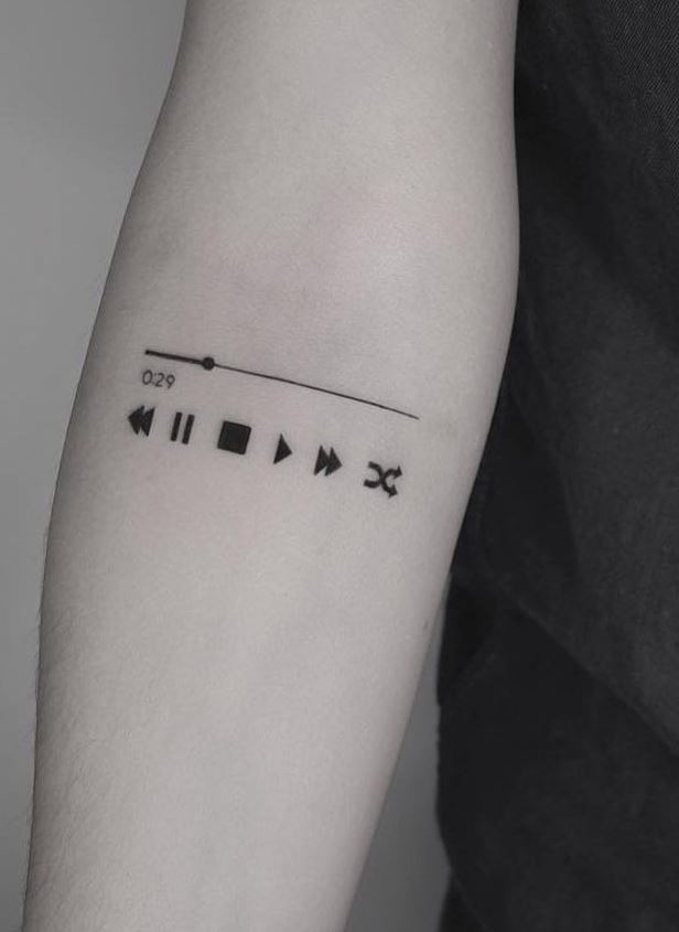 Music Playing Tattoo