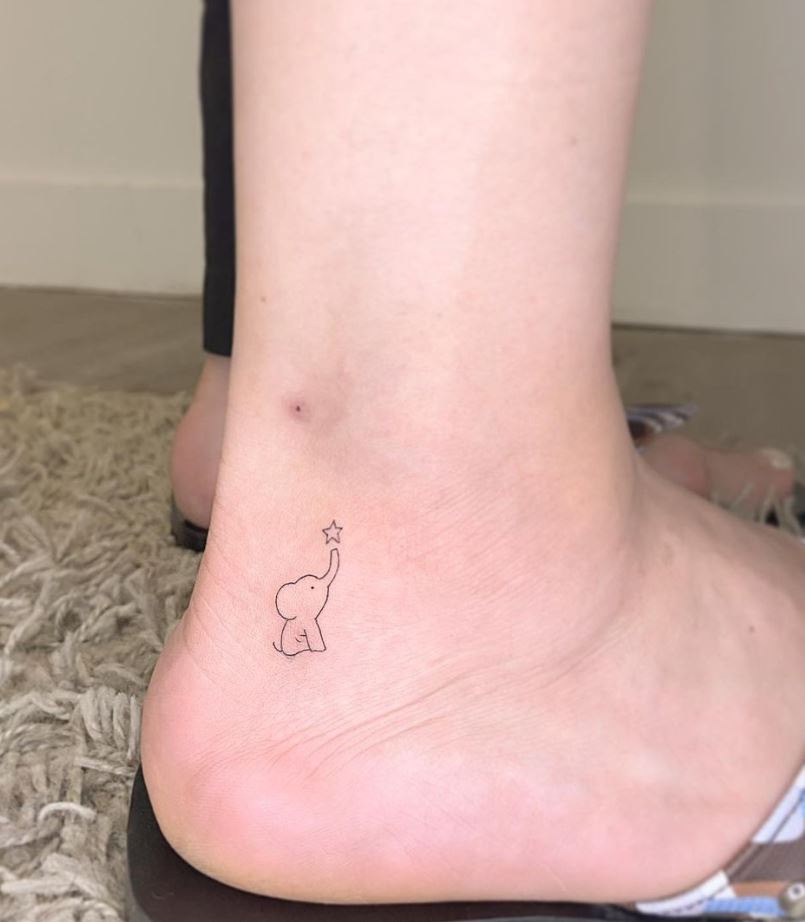 Tiny Elephant Tattoo